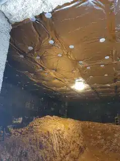 Isolation du plafond d'un garage à Vitré avec panneaux isolants réfléchissants